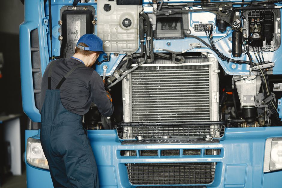 HVAC Emergency Repair vs. It Can Wait Until Tomorrow: A Homeowner's Guide | FAST HVAC HVAC technician diagnosing a furnace during an after-hours emergency repair visit