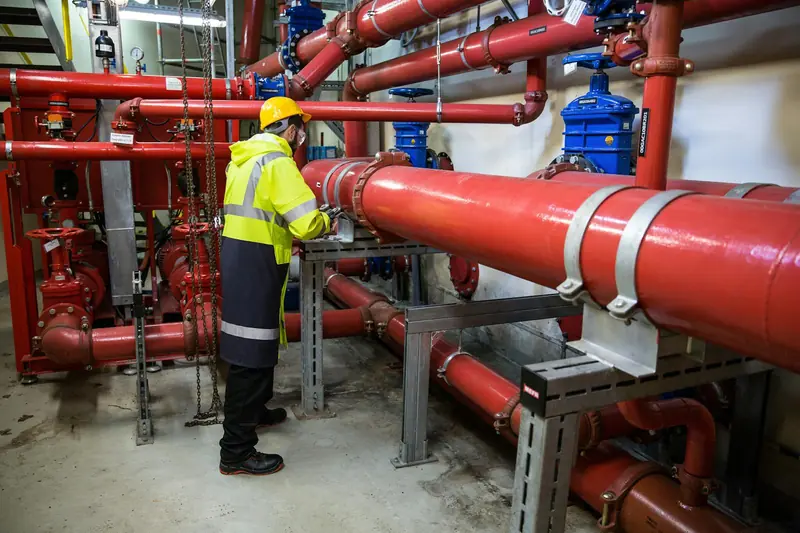 MaxRooter plumber working on residential pipes