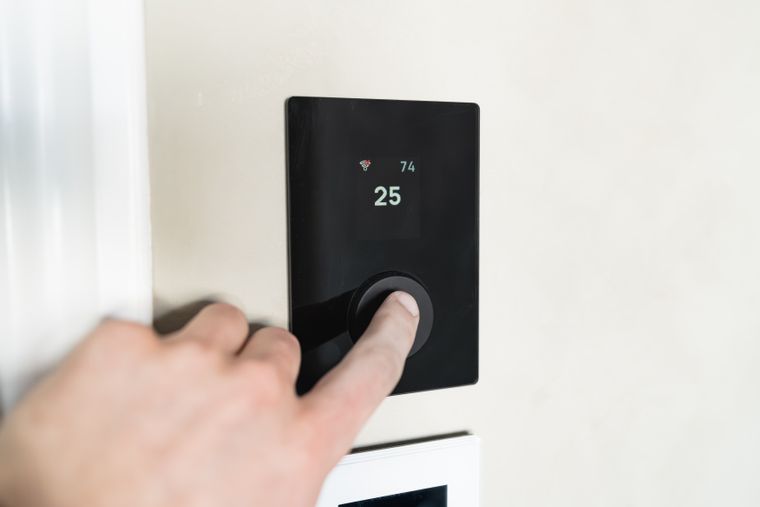 Smart Thermostat Installation showing a smart thermostat installed in a home
