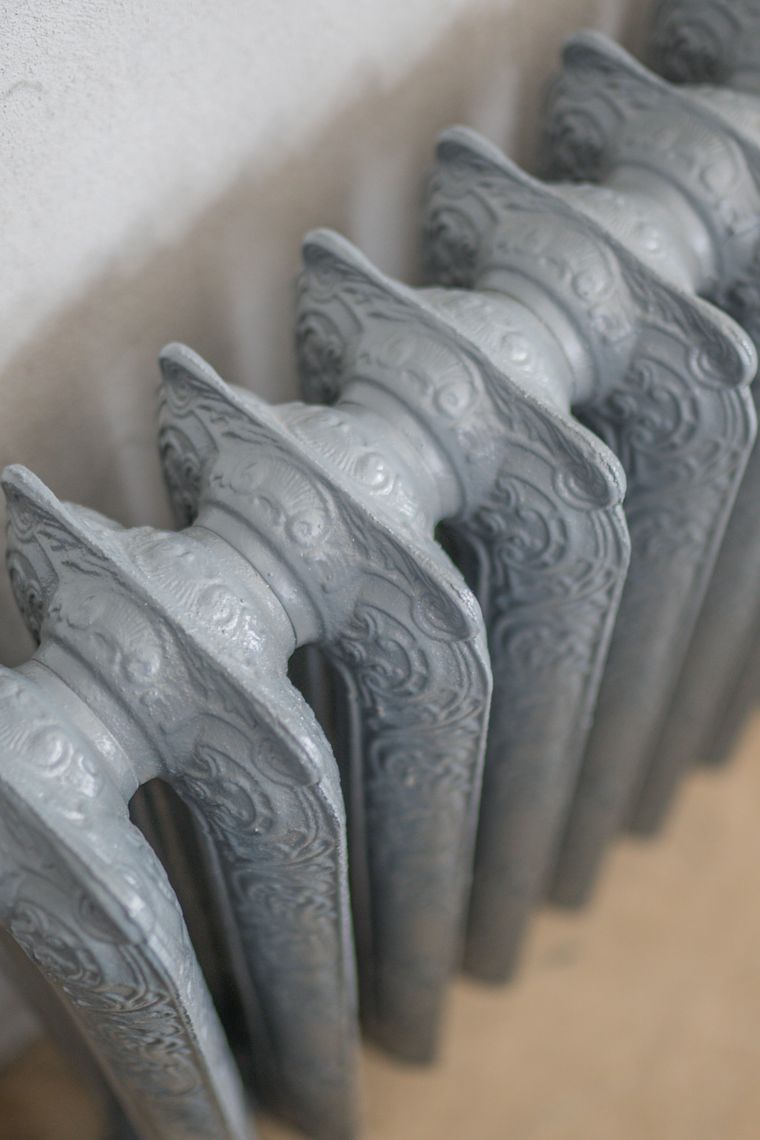 Furnace Tune-Up showing a residential radiator and heating system