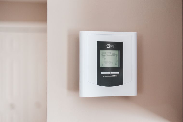 Smart Thermostat Installation showing a thermostat used to control home temperature